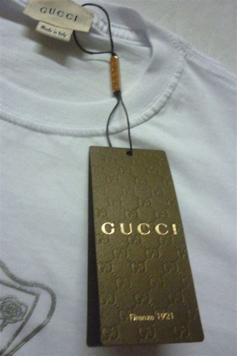 como identificar ropa gucci original